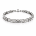 Rhodium plated silver double row tennis bracelet with clear cubic zirconia stones and box clasp, 17 cm length with extender.
