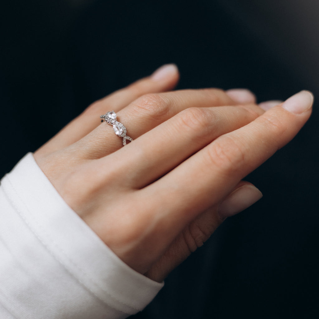 Rhodium Plated Infinity Ring with CZ – Adjustable Size 7–8