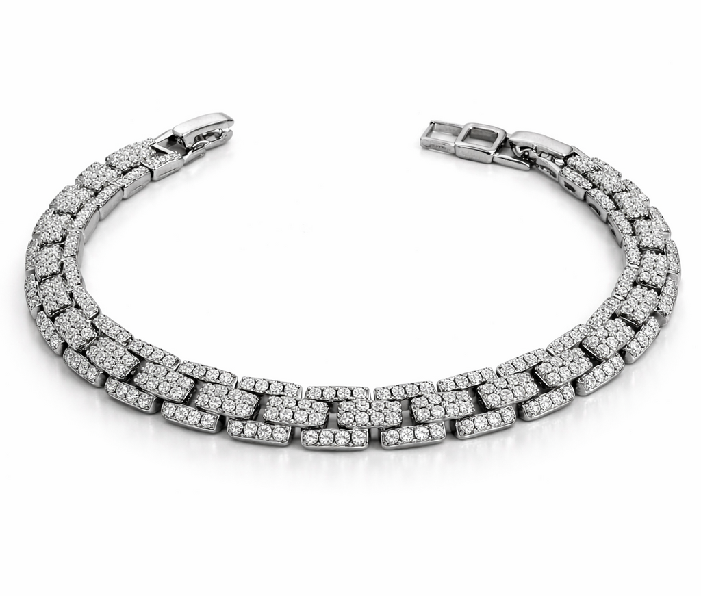 Rhodium plated silver multi row link bracelet with clear cubic zirconia stones and box clasp, 17.5 cm length.
