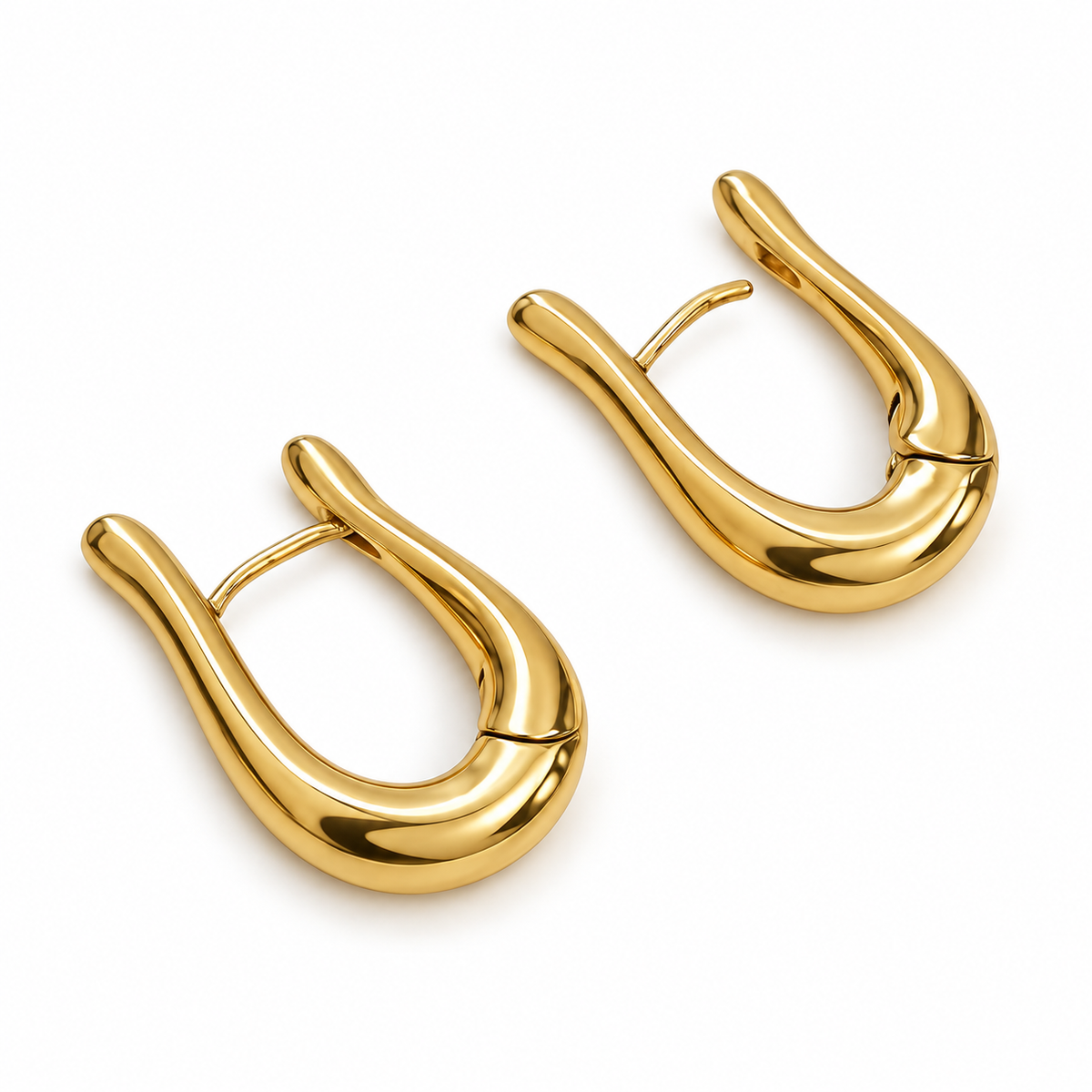 Polished gold-plated teardrop hoop earrings with a curved, tapered shape and English lock closures, shown from the front and side.