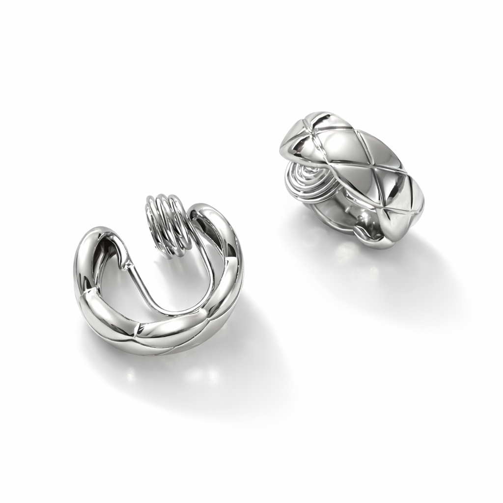Silver clip-on ear cuff earrings with coil detail, minimalist cartilage cuff design, 1.7 cm diameter, 5 mm width.
