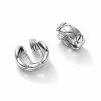 Silver clip-on ear cuff earrings with coil detail, minimalist cartilage cuff design, 1.7 cm diameter, 5 mm width.
